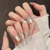 Handmade Nail Studs – Elegant & Exquisite Designs for Nail Art3122-2 A set of handmade nail studs in various elegant designs, perfect for adding a sophisticated touch to your nail art.