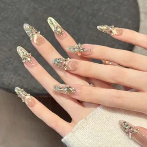 Home 4 A set of handmade nail studs in various elegant designs, perfect for adding a sophisticated touch to your nail art.