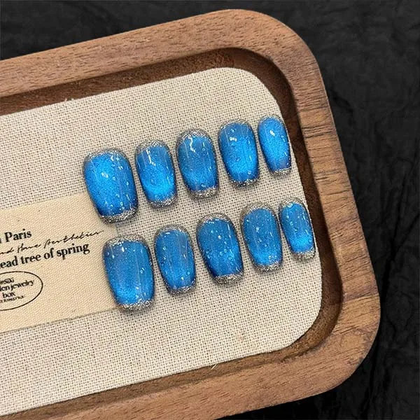 Handcrafted Elegance: Why Handmade Nail Studs Are the Key to Exquisite Nail Decorations 4 A set of handmade nail studs in various elegant designs, perfect for adding a sophisticated touch to your nail art.