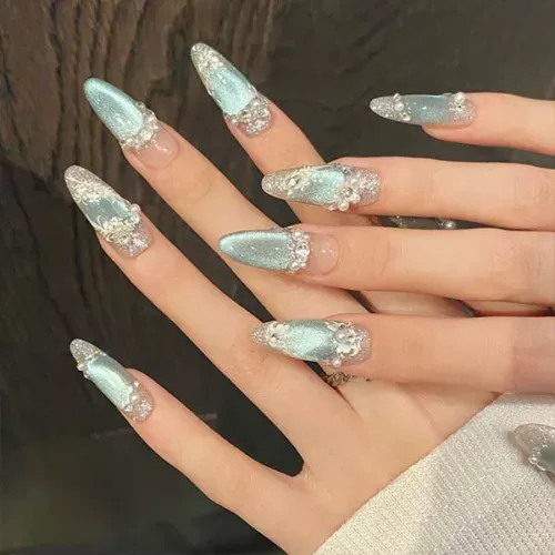 A set of handmade nail studs in various elegant designs, perfect for adding a sophisticated touch to your nail art.