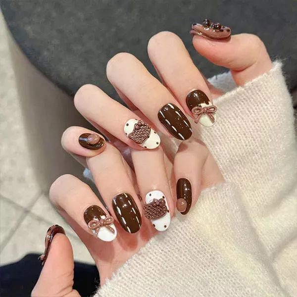 A set of handmade nail studs in various elegant designs, perfect for adding a sophisticated touch to your nail art.