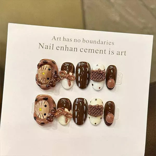 A set of handmade nail studs in various elegant designs, perfect for adding a sophisticated touch to your nail art.