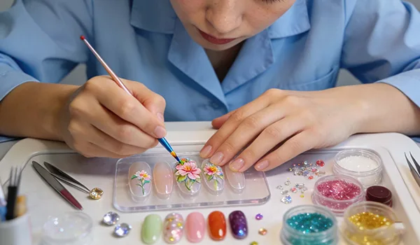 A set of handmade nail studs in various elegant designs, perfect for adding a sophisticated touch to your nail art.