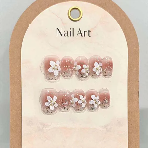A set of handmade nail studs in various elegant designs, perfect for adding a sophisticated touch to your nail art.