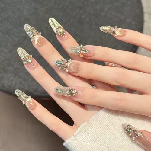 A set of handmade nail studs in various elegant designs, perfect for adding a sophisticated touch to your nail art.