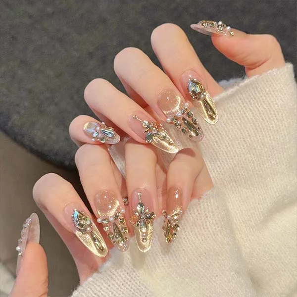 A set of handmade nail studs in various elegant designs, perfect for adding a sophisticated touch to your nail art.