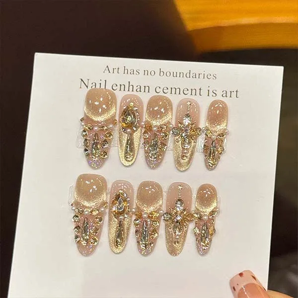 A set of handmade nail studs in various elegant designs, perfect for adding a sophisticated touch to your nail art.