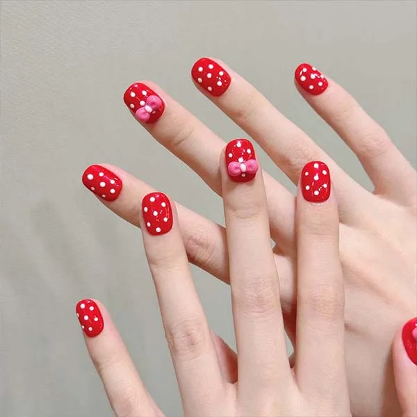 A set of handmade nail studs in various elegant designs, perfect for adding a sophisticated touch to your nail art.