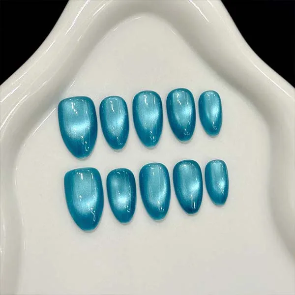 A set of handmade nail studs in various elegant designs, perfect for adding a sophisticated touch to your nail art.