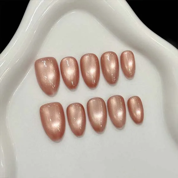 A set of handmade nail studs in various elegant designs, perfect for adding a sophisticated touch to your nail art.