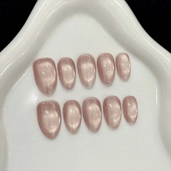 Close-up of custom-made handmade nail studs, designed to elevate the look of your nails with exquisite craftsmanship.