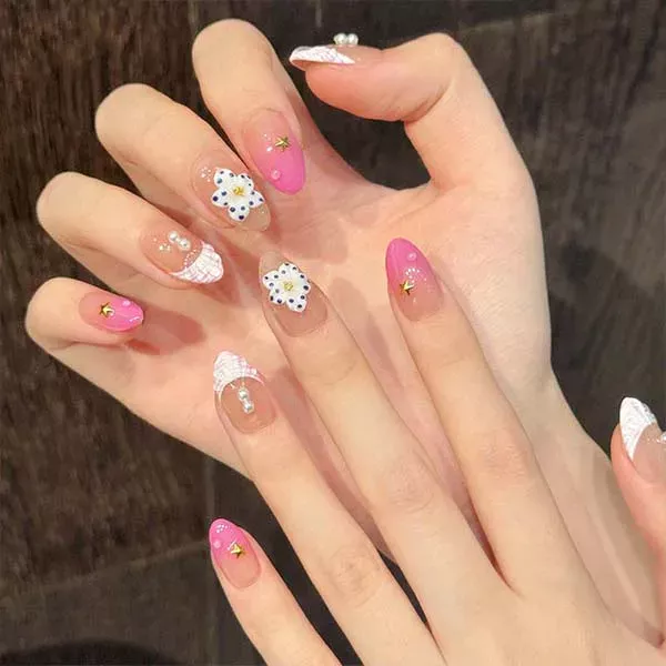A set of handmade nail studs in various elegant designs, perfect for adding a sophisticated touch to your nail art.