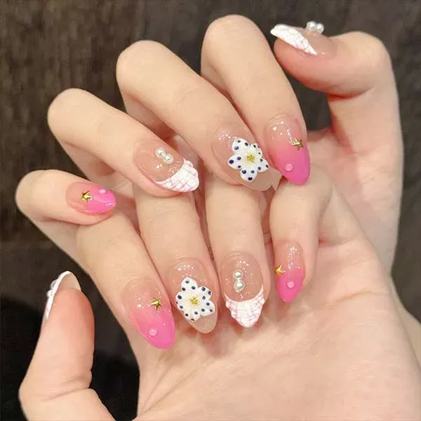 A set of handmade nail studs in various elegant designs, perfect for adding a sophisticated touch to your nail art.
