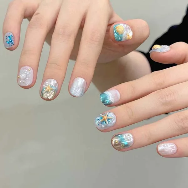 Close-up of custom-made handmade nail studs, designed to elevate the look of your nails with exquisite craftsmanship.