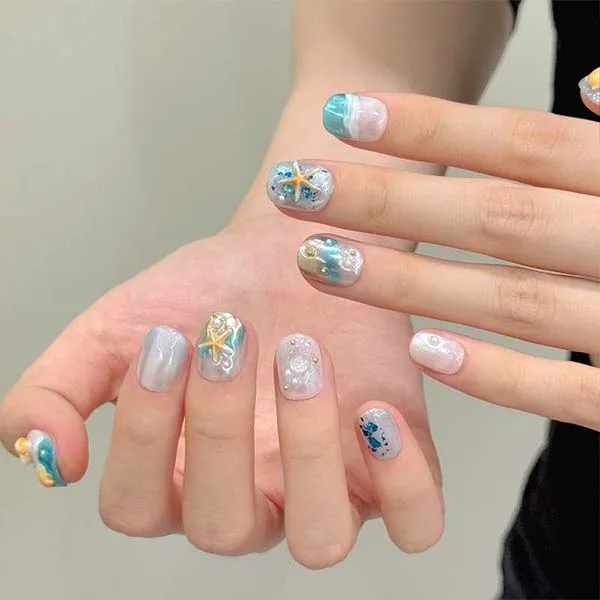 Close-up of custom-made handmade nail studs, designed to elevate the look of your nails with exquisite craftsmanship.