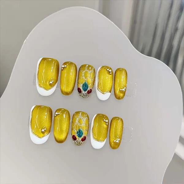 A set of handmade nail studs in various elegant designs, perfect for adding a sophisticated touch to your nail art.