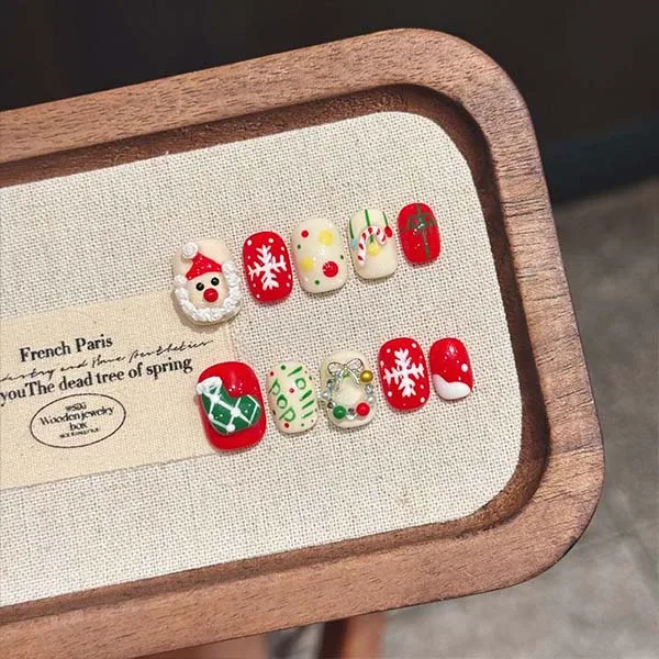 A set of handmade nail studs in various elegant designs, perfect for adding a sophisticated touch to your nail art.