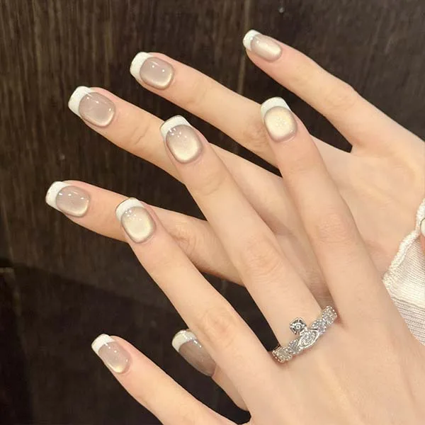 A set of handmade nail studs in various elegant designs, perfect for adding a sophisticated touch to your nail art.