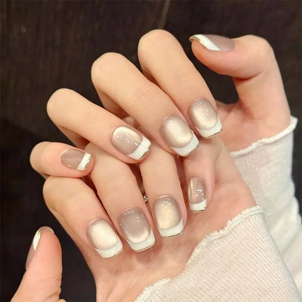 A set of handmade nail studs in various elegant designs, perfect for adding a sophisticated touch to your nail art.