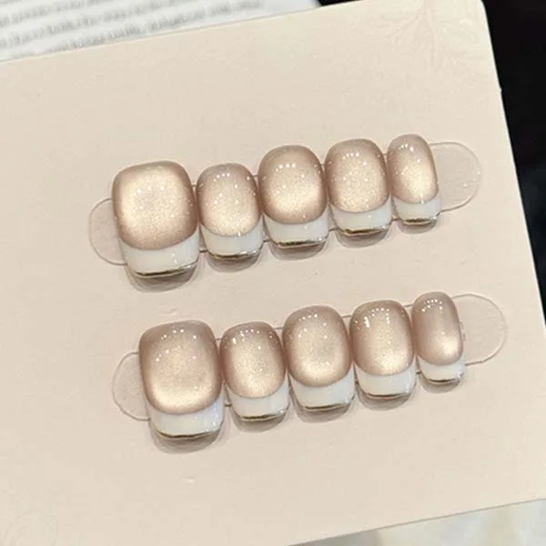 A set of handmade nail studs in various elegant designs, perfect for adding a sophisticated touch to your nail art.