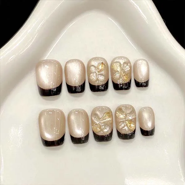 Close-up of custom-made handmade nail studs, designed to elevate the look of your nails with exquisite craftsmanship.