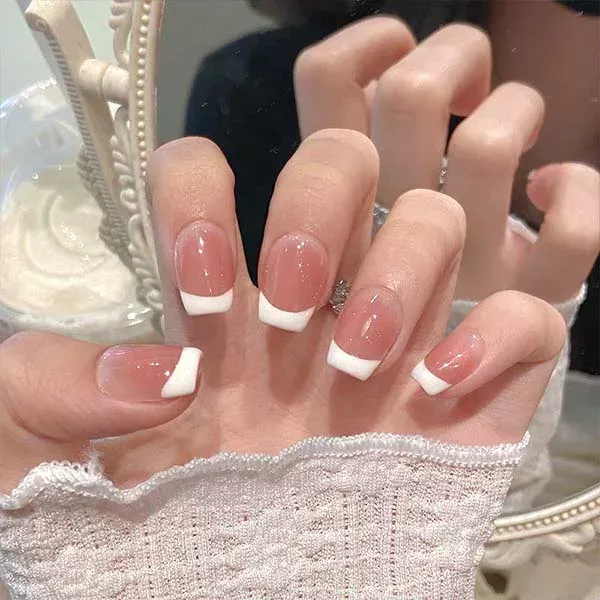 A set of handmade nail studs in various elegant designs, perfect for adding a sophisticated touch to your nail art.