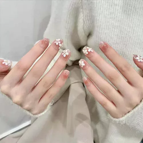 A set of handmade nail studs in various elegant designs, perfect for adding a sophisticated touch to your nail art.