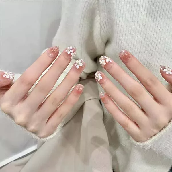 A set of handmade nail studs in various elegant designs, perfect for adding a sophisticated touch to your nail art.