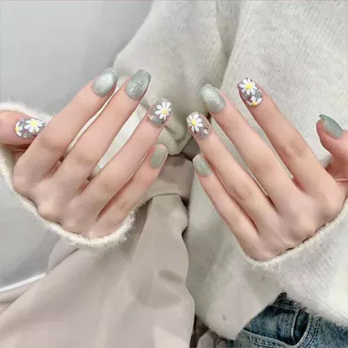 A set of handmade nail studs in various elegant designs, perfect for adding a sophisticated touch to your nail art.