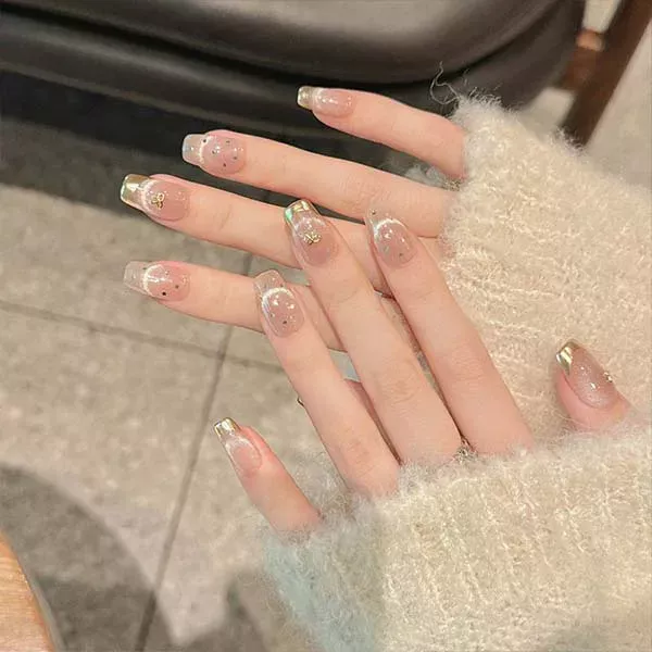 Close-up of custom-made handmade nail studs, designed to elevate the look of your nails with exquisite craftsmanship.