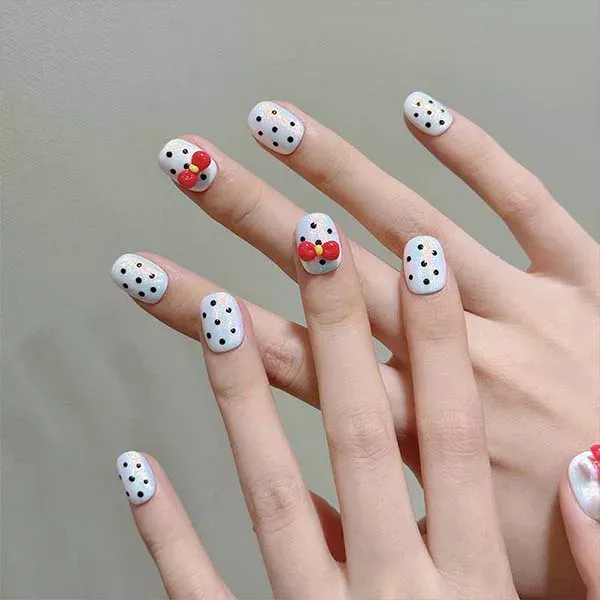 A set of handmade nail studs in various elegant designs, perfect for adding a sophisticated touch to your nail art.