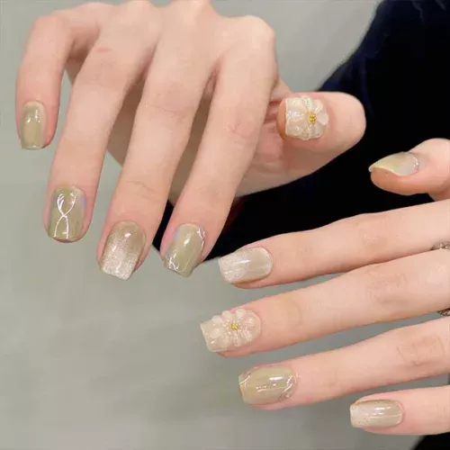 A set of handmade nail studs in various elegant designs, perfect for adding a sophisticated touch to your nail art.