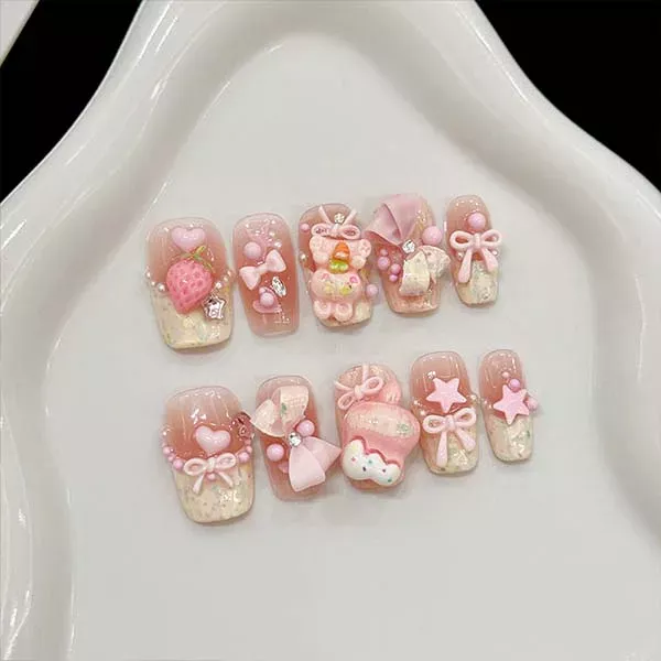 A set of handmade nail studs in various elegant designs, perfect for adding a sophisticated touch to your nail art.