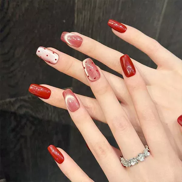 A set of handmade nail studs in various elegant designs, perfect for adding a sophisticated touch to your nail art.