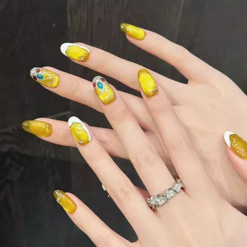 A set of handmade nail studs in various elegant designs, perfect for adding a sophisticated touch to your nail art.