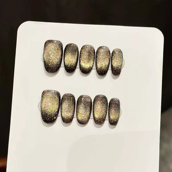 A set of handmade nail studs in various elegant designs, perfect for adding a sophisticated touch to your nail art.