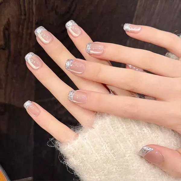 A set of handmade nail studs in various elegant designs, perfect for adding a sophisticated touch to your nail art.