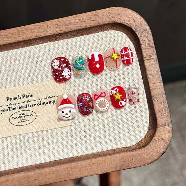 A set of handmade nail studs in various elegant designs, perfect for adding a sophisticated touch to your nail art.